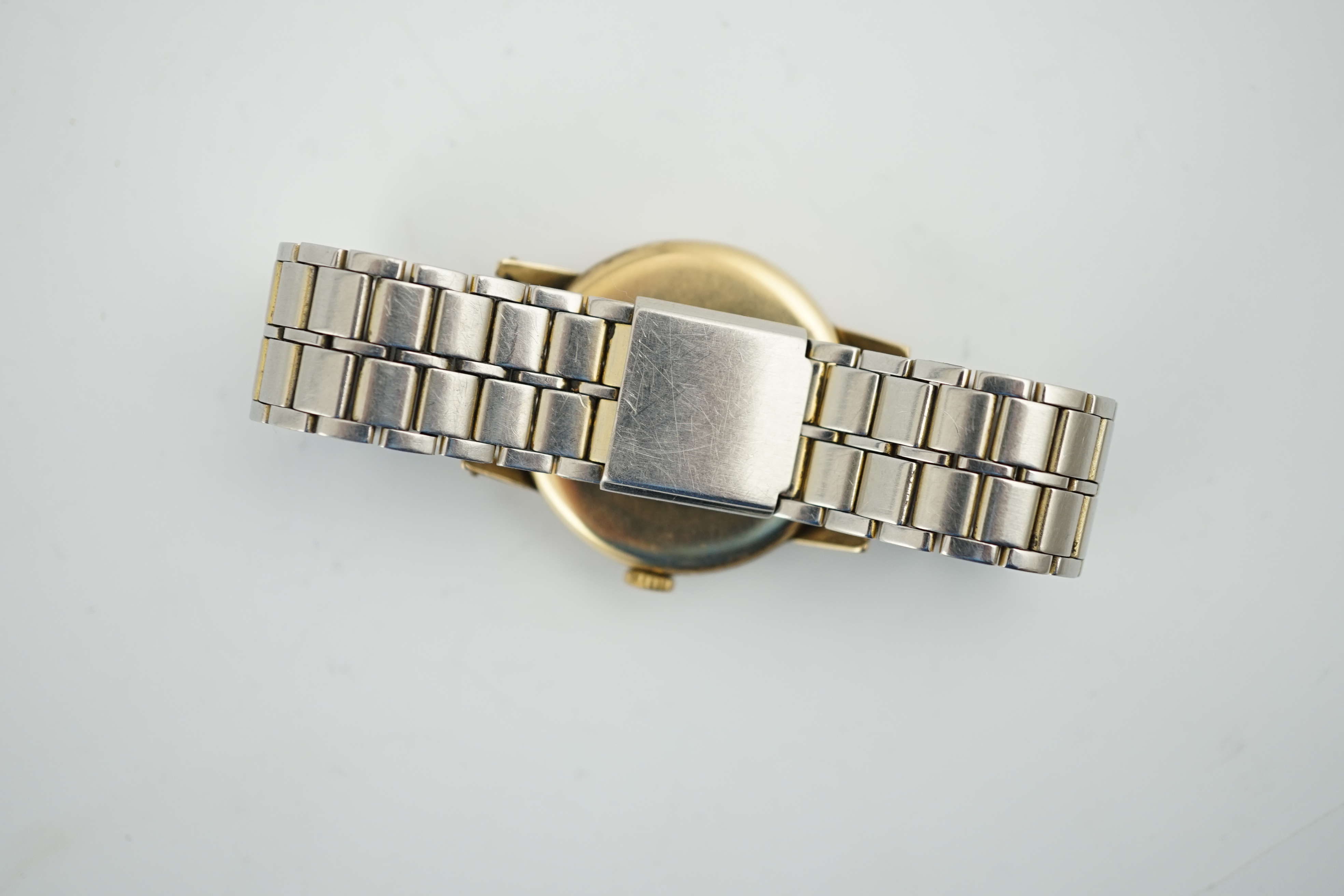 A gentleman's late 1950's 9ct gold Longines manual wind wrist watch